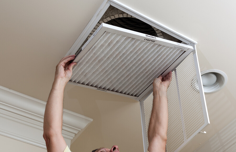 bigstock Senior Man Opening Air Conditi 34237079