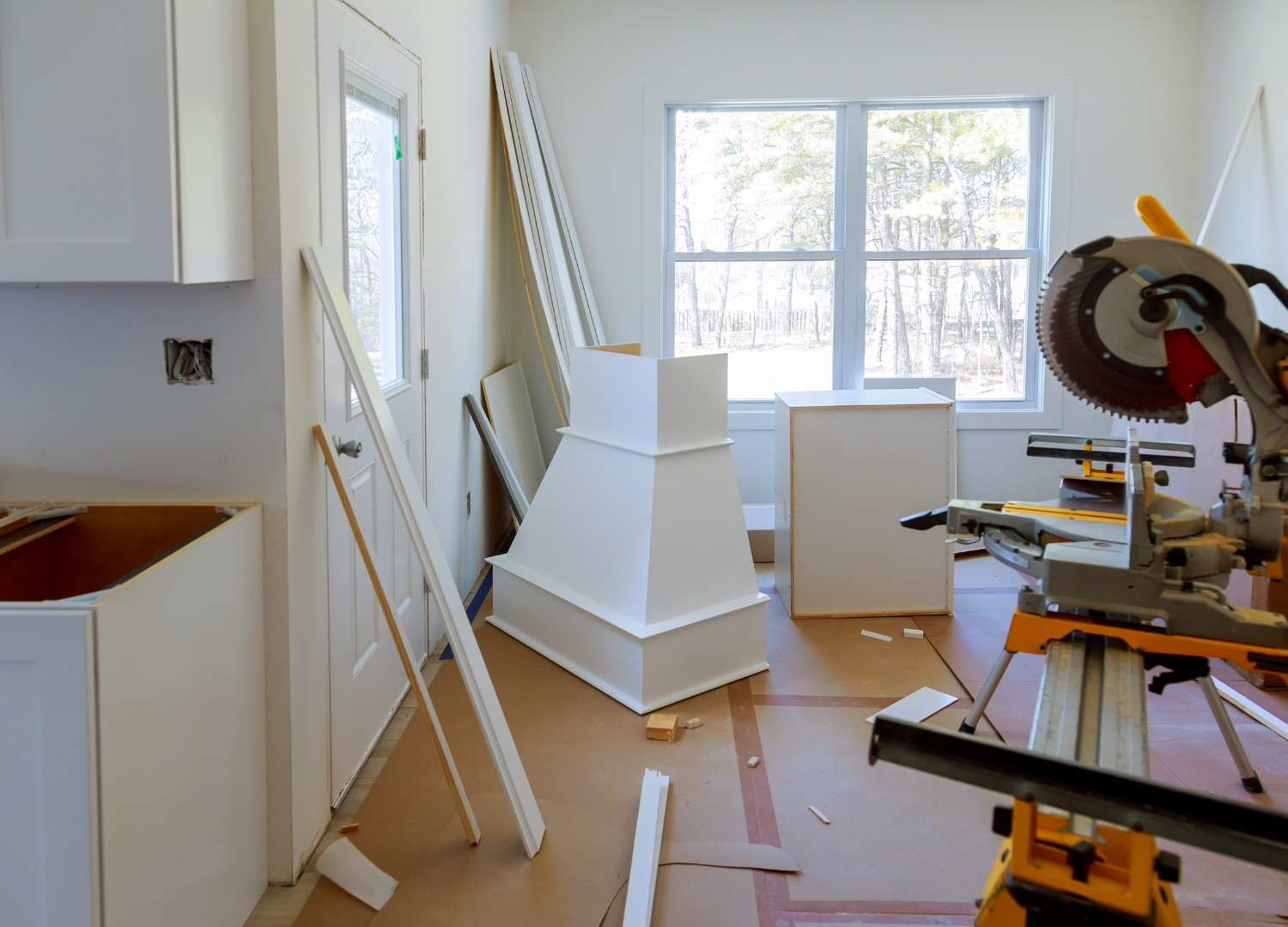 table saw in a kitchen remodel with cabinets