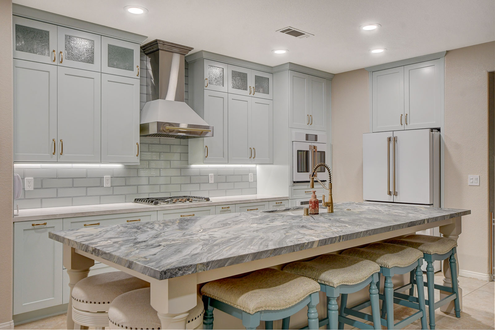 Kitchen with island counter and door to the outside